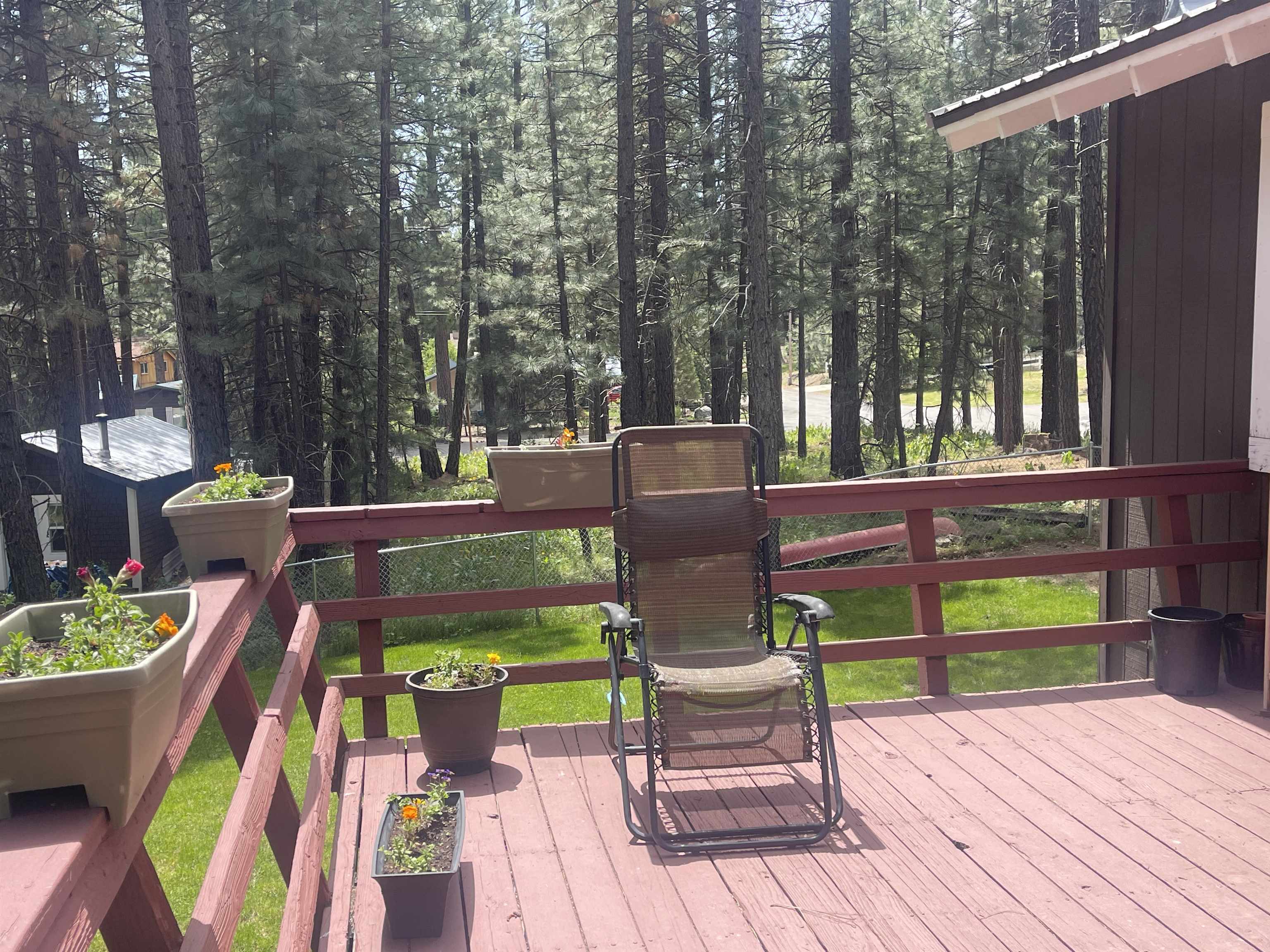 302 Mountain View Road Calpine, CA 96124 - Photo 5 of 26 a view of a chairs and table in the patio