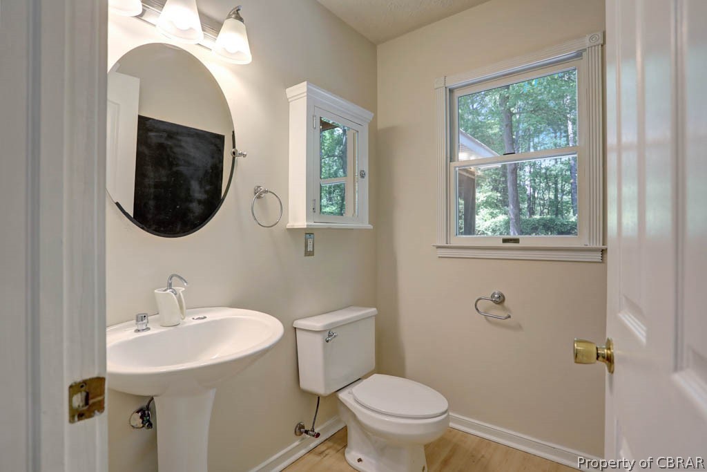 7025 Mumford Cove Road Hayes, VA 23072 - Photo 13 of 43 Down stairs half???????????????????????????????? bath