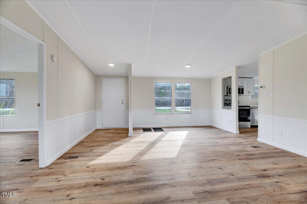 10942 Simms Road Bailey, NC 27807 - Photo 5 of 44 a view of an empty room with a window