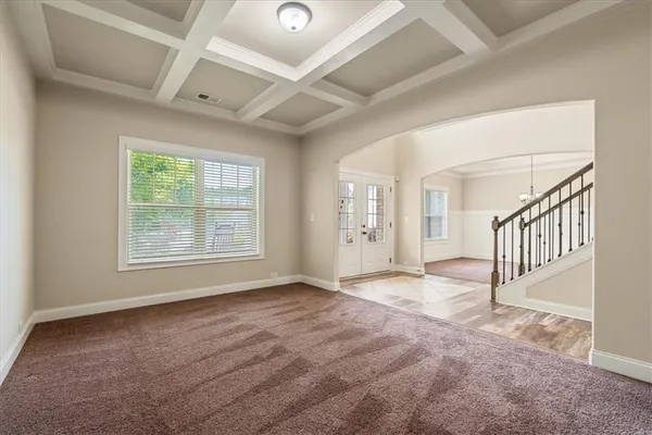 an empty room with windows