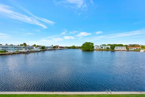 a view of a lake with houses