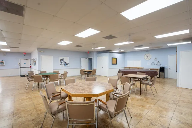 a view of a dining room with furniture