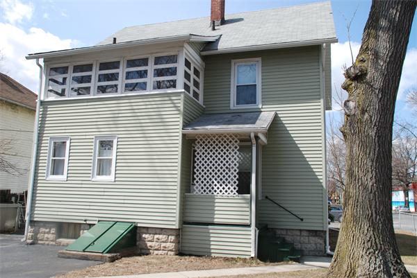125 Stockman Street Springfield, MA 01104 - Photo 2 of 10 a front view of a house with a tree
