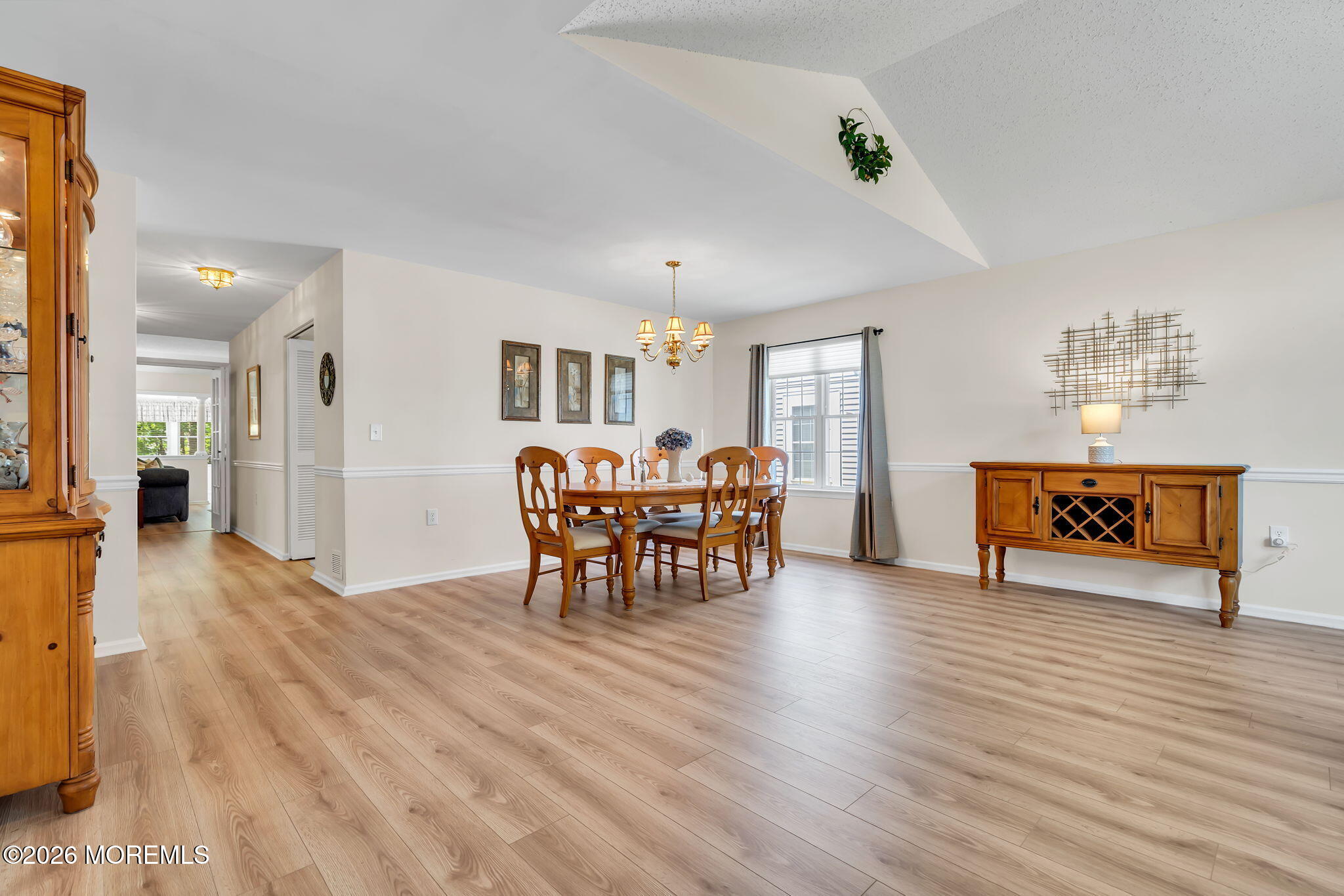 10 Congressional Road Jackson, NJ 08527 - Photo 5 of 72 a view of a livingroom with furniture and a dining room