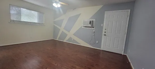 an empty room with windows