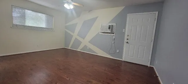 an empty room with windows