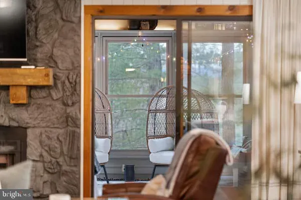 a view of balcony with furniture