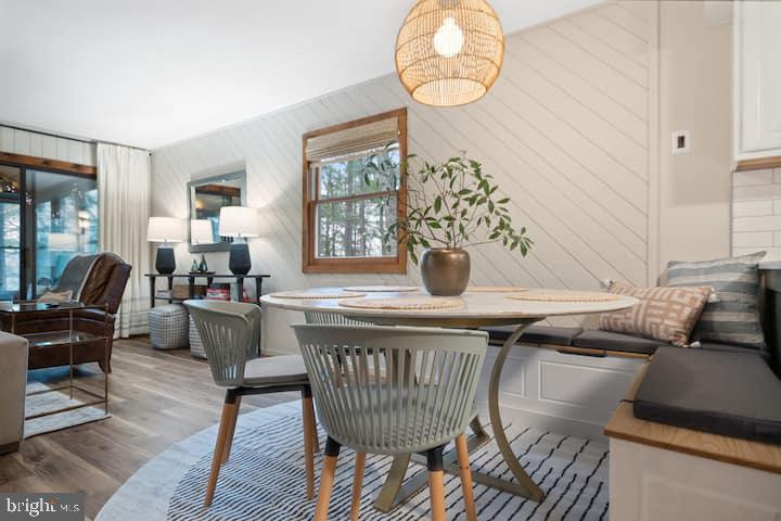 162 Forrest Street Basye, VA 22810 - Photo 26 of 41 a view of a dining room with furniture wooden floor and a chandelier
