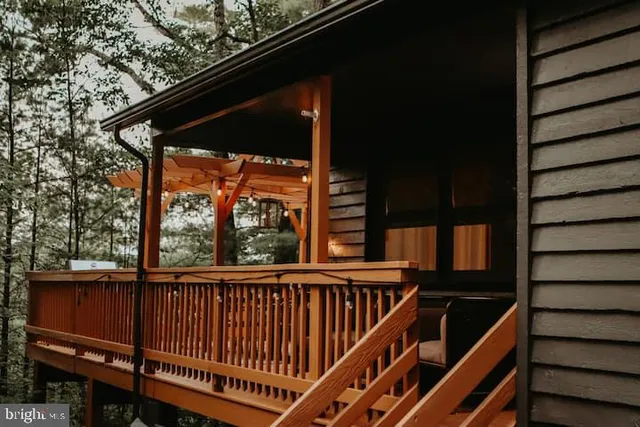 a view of a balcony with furniture