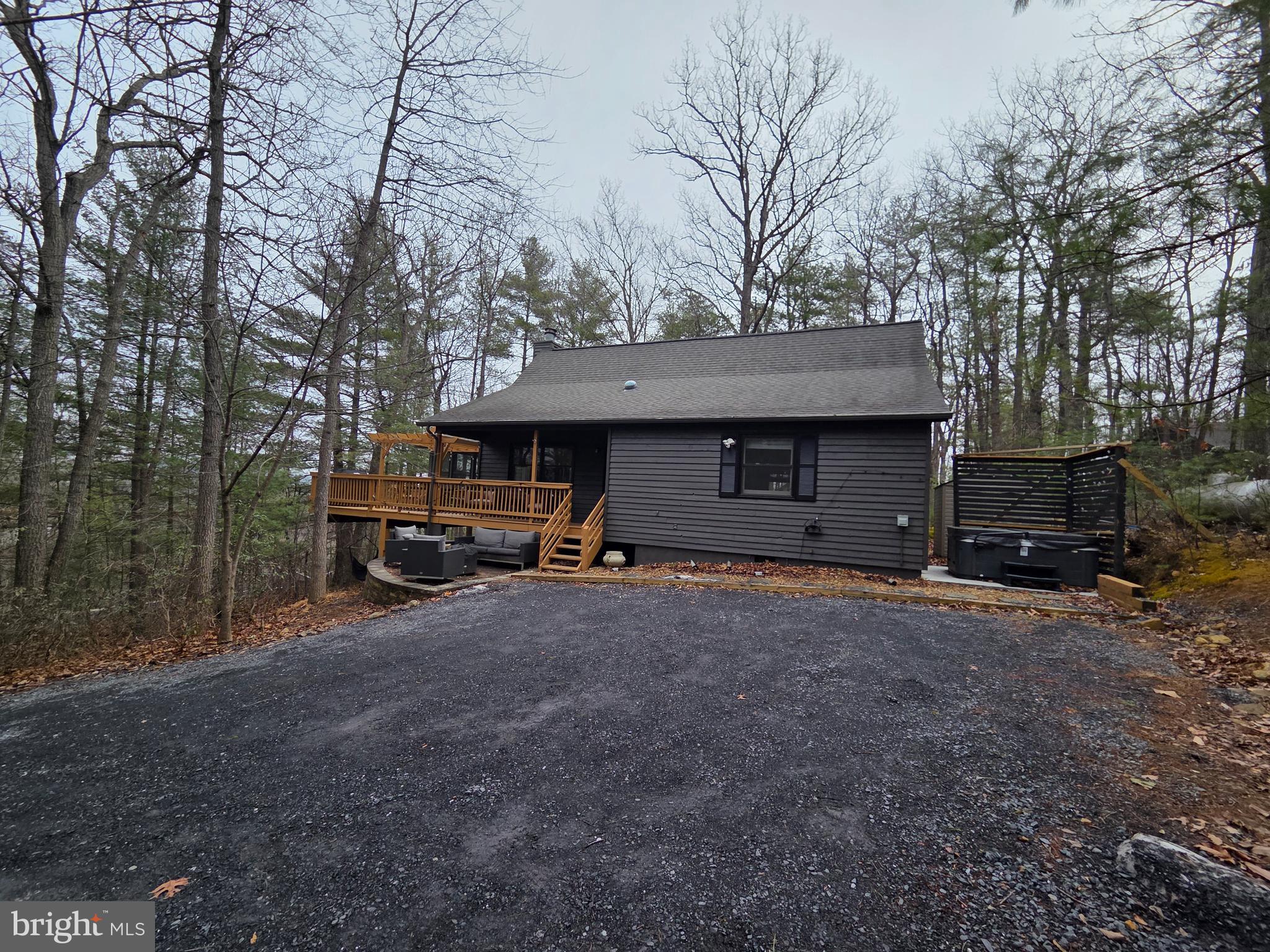 162 Forrest Street Basye, VA 22810 - Photo 42 of 50 a view of a house with a yard and garage