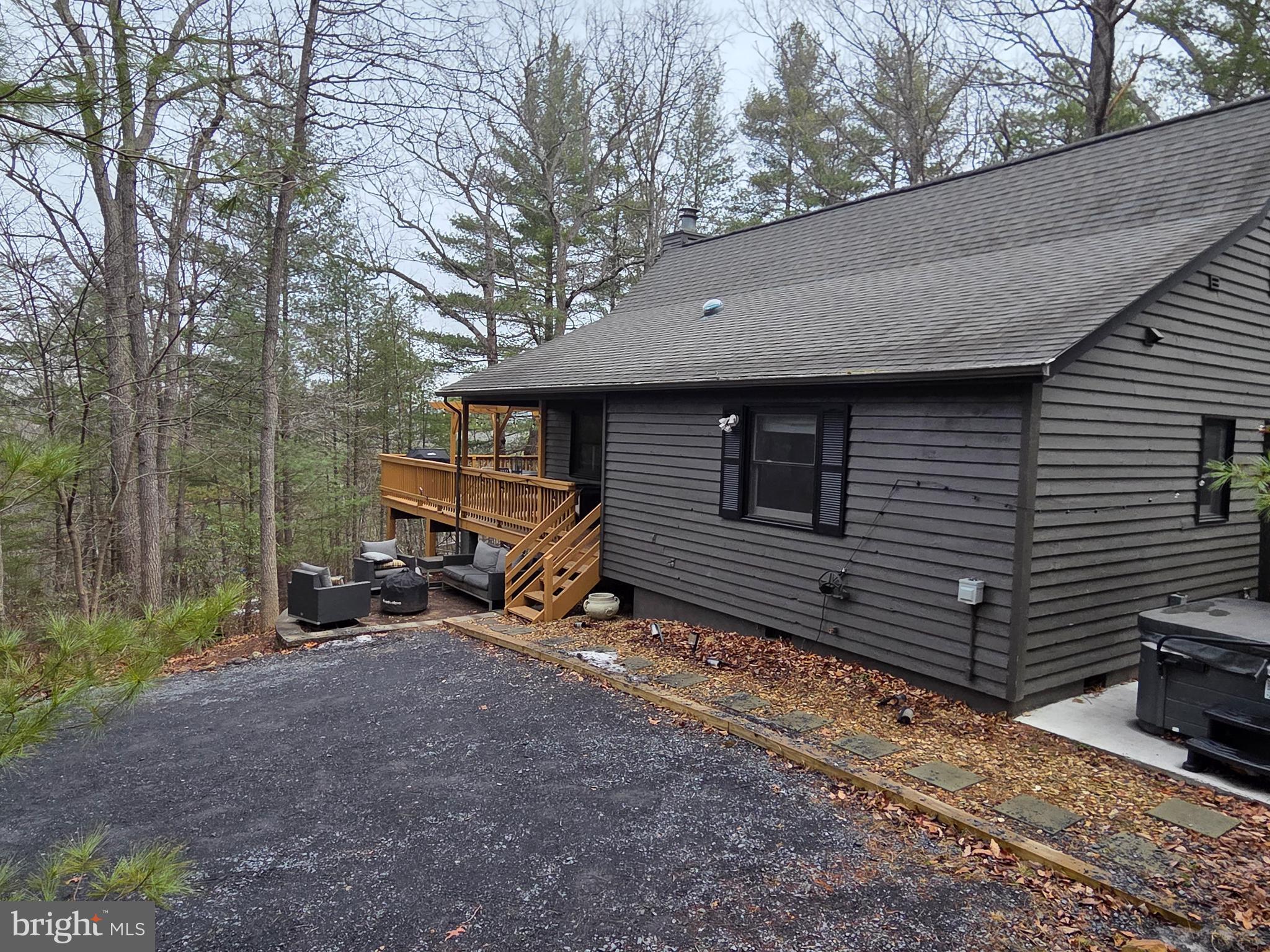 162 Forrest Street Basye, VA 22810 - Photo 46 of 50 a view of a house with a yard and wooden fence