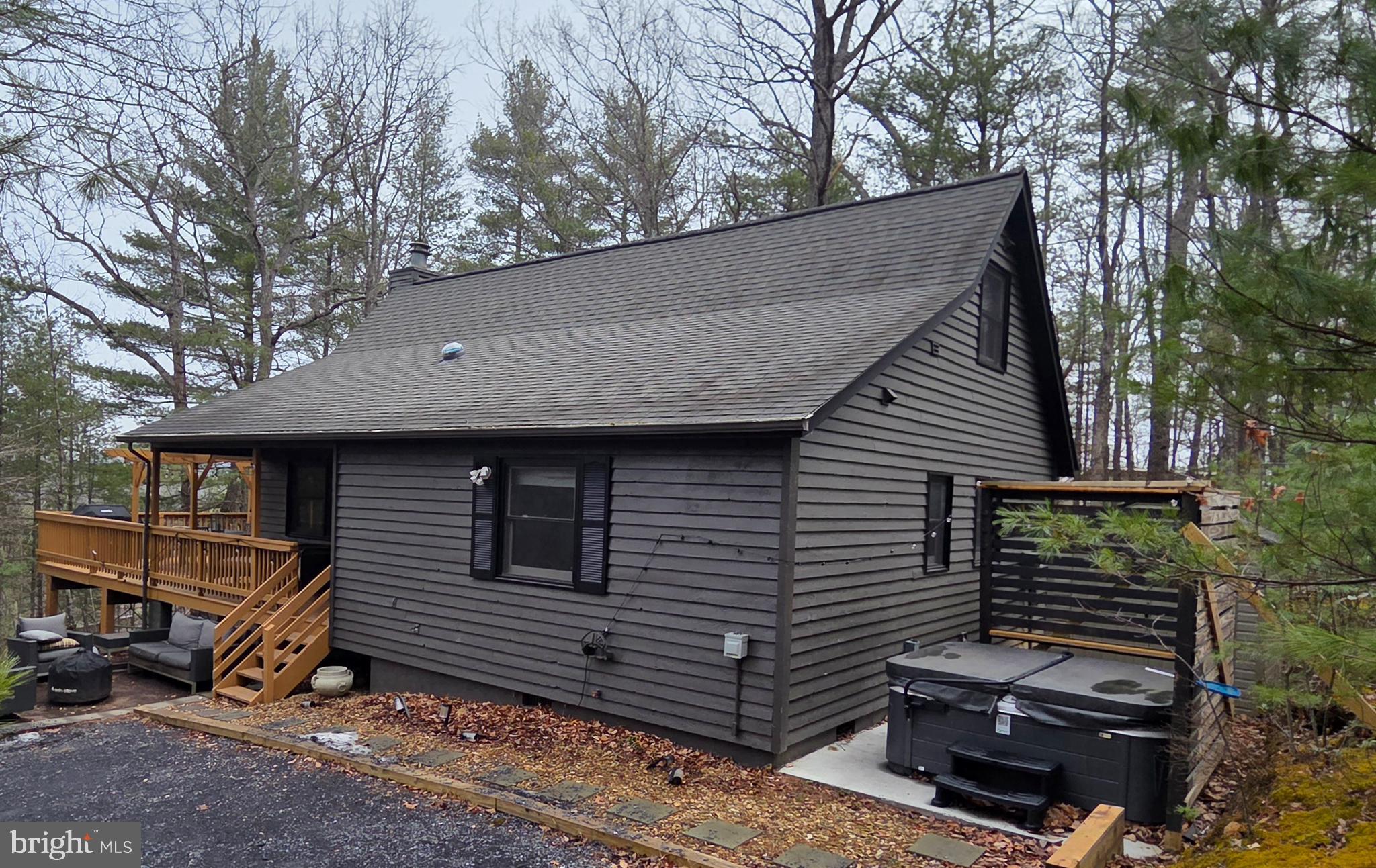 162 Forrest Street Basye, VA 22810 - Photo 48 of 50 a front view of a house with garden