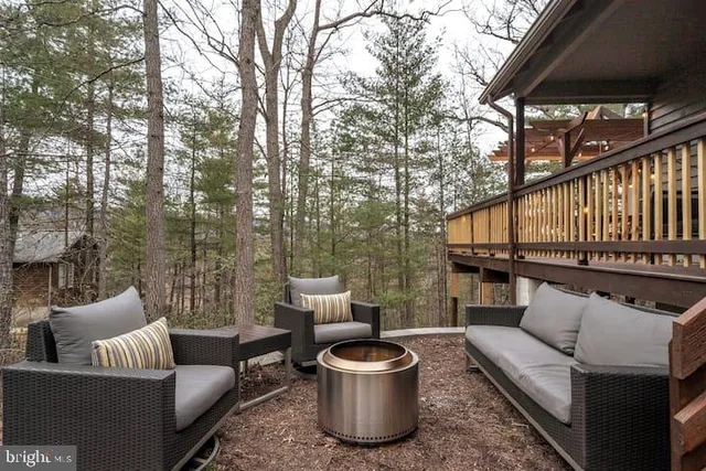 a patio with patio a couch and chairs