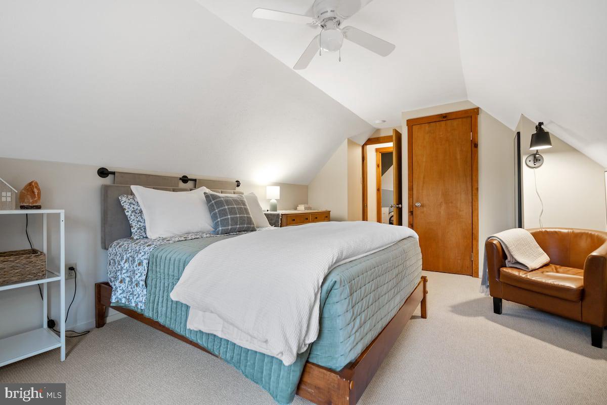 162 Forrest Street Basye, VA 22810 - Photo 10 of 41 a spacious bedroom with a bed and a couch