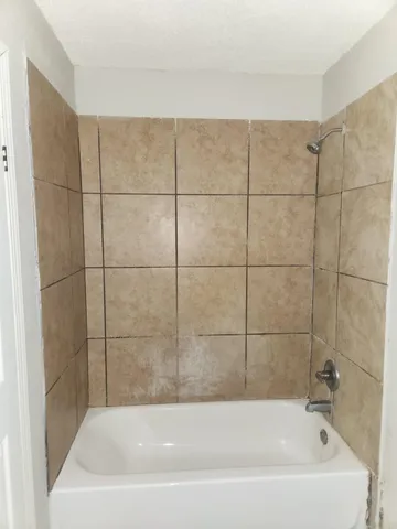 a bathroom with a bathtub