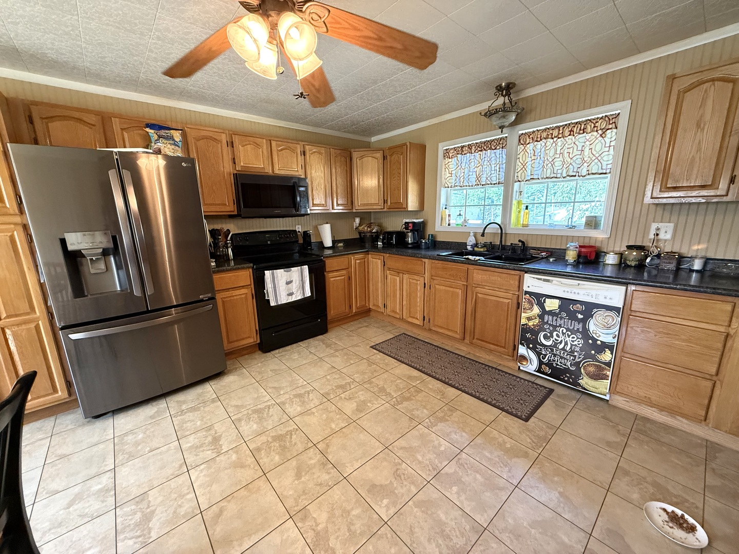 601 Ohio Street Grand Chain, IL 62941 - Photo 5 of 31 a kitchen with stainless steel appliances granite countertop a refrigerator and a stove top oven