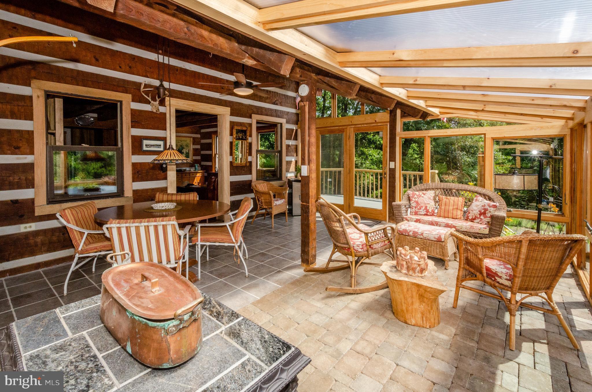 38356 Hughesville Road Hamilton, VA 20158 - Photo 5 of 30 Sun room w/ soapstone wood stove