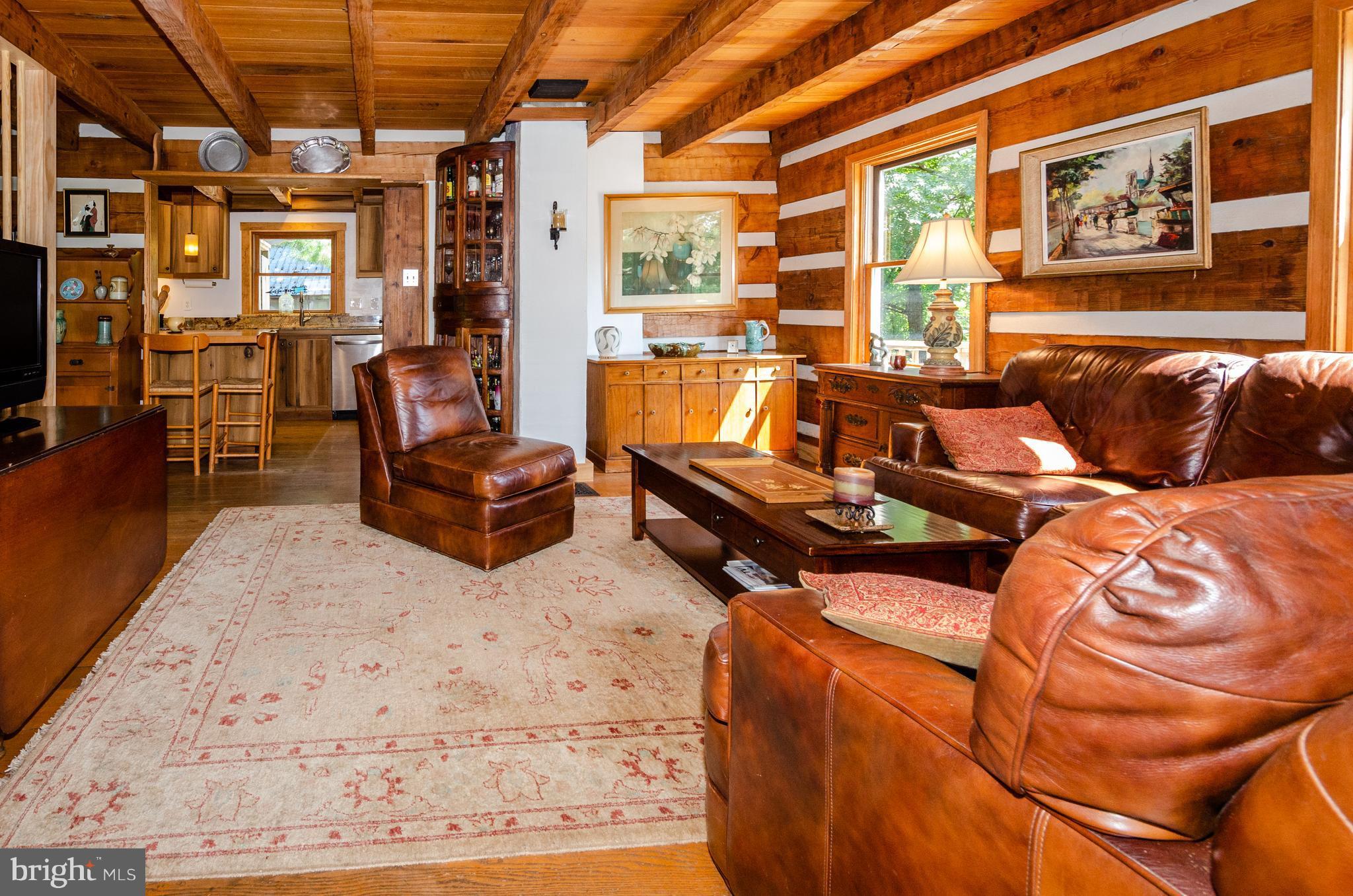 38356 Hughesville Road Hamilton, VA 20158 - Photo 8 of 30 Hardwood floors, exposed log walls + ceiling beams