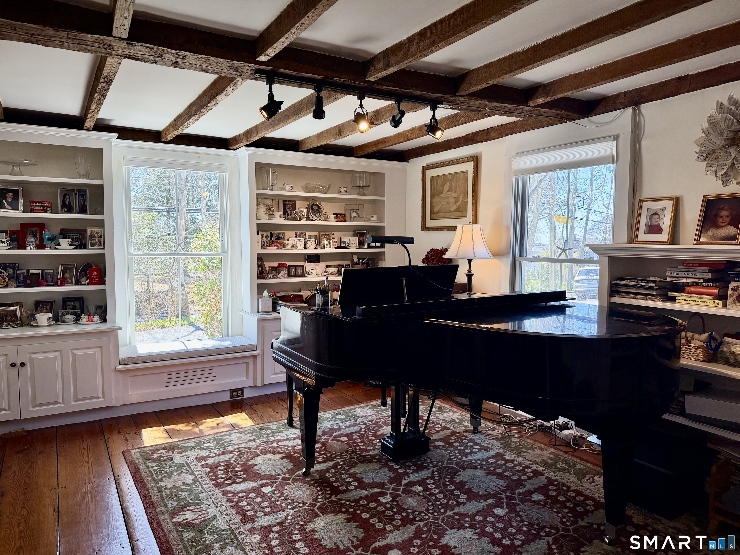 509 Boston Post Road Madison, CT 06443 - Photo 23 of 34 1st Floor Office or Library. Currently a music room. Piano is not for tenant use.