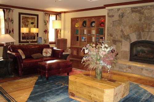 500 Village Road, Unit 206 217 Breckenridge, CO 80424 - Photo 12 of 20 a living room with furniture and a large window