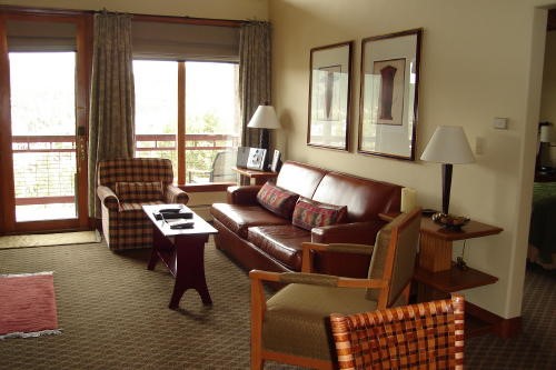 500 Village Road, Unit 206 217 Breckenridge, CO 80424 - Photo 4 of 20 a living room with furniture and a window