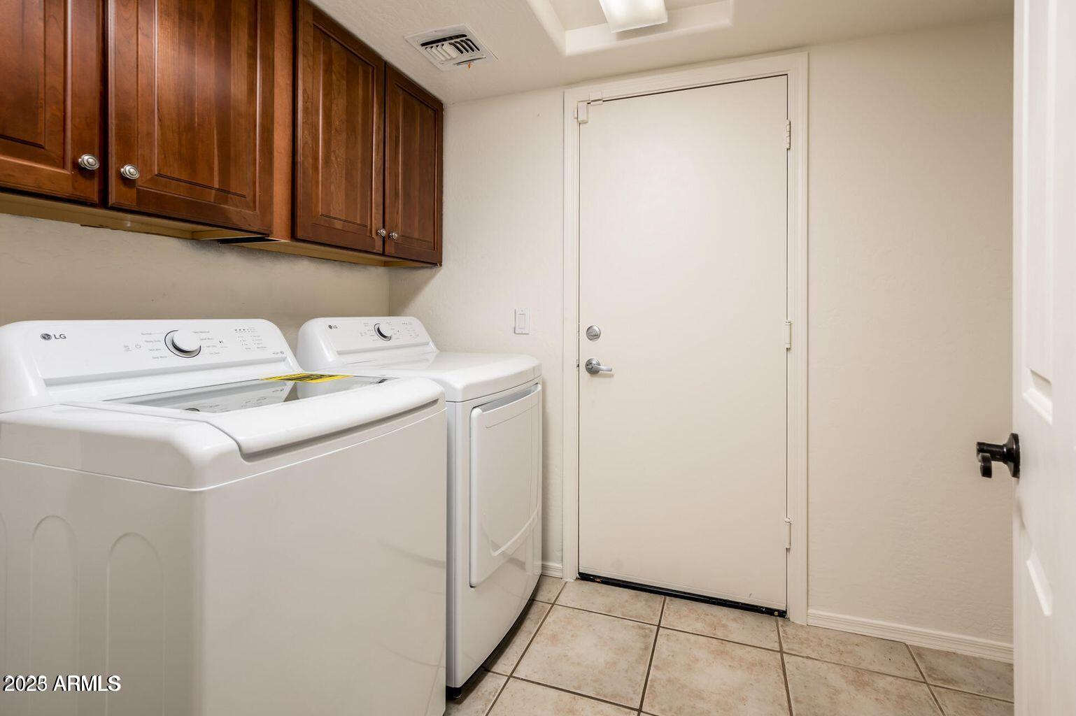 13604 West Rovey Avenue Litchfield Park, AZ 85340 - Photo 27 of 33 a utility room with dryer and washer
