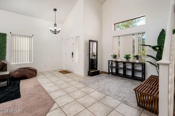 a bedroom with furniture and a window