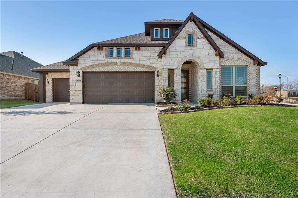 1600 Nighthawk Lane Mansfield, TX 76063 - Photo 1 of 1 a front view of a house with a yard