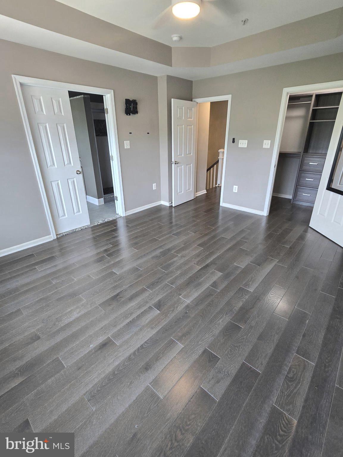 11847 Skylark Road Clarksburg, MD 20871 - Photo 33 of 46 wooden floor in an empty room with a window