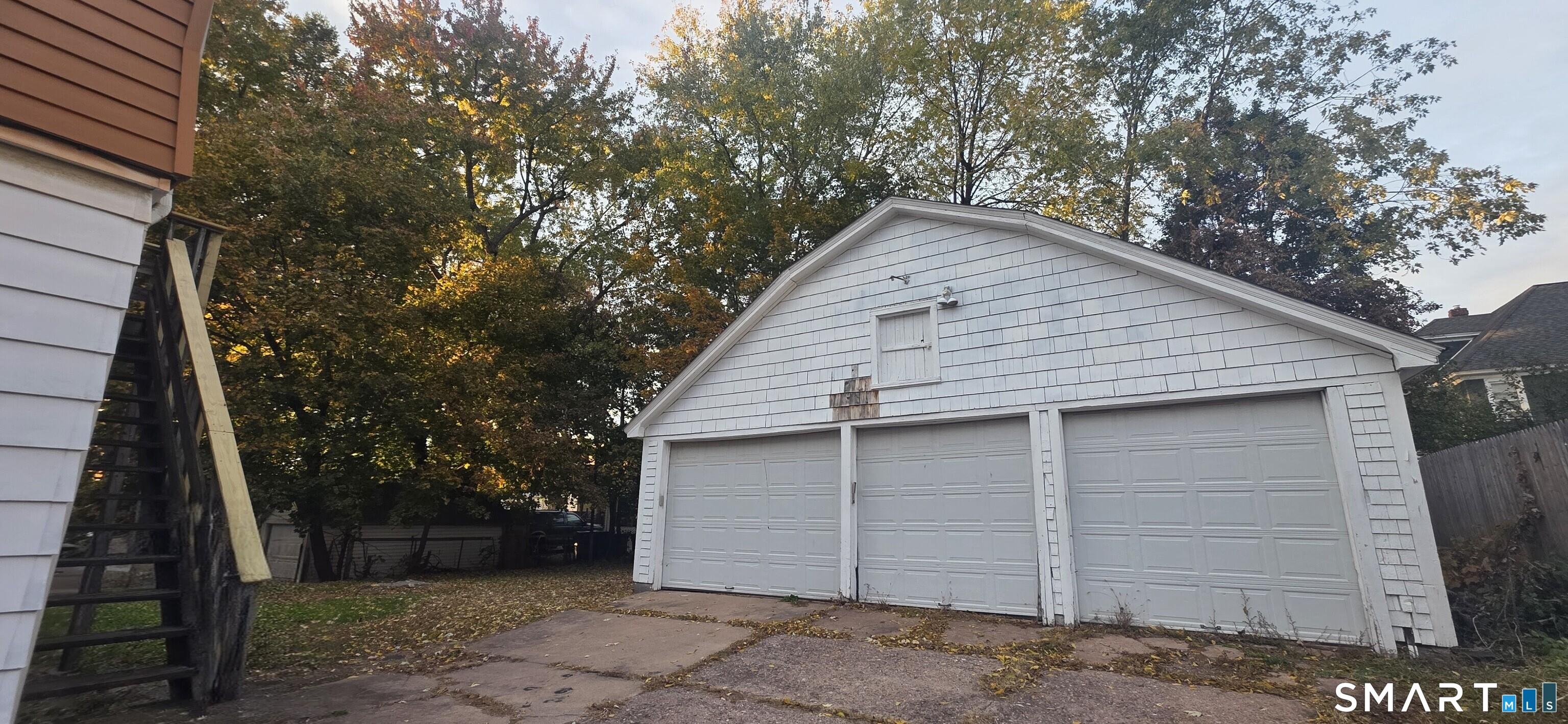 137 Birch Street, Unit 139 Manchester, CT 06040 - Photo 13 of 14 a view of a small house with a garage