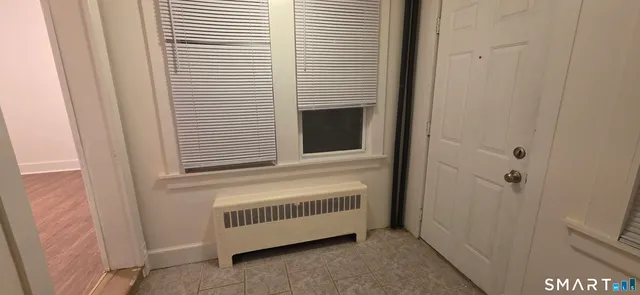 a view of a porch with a door