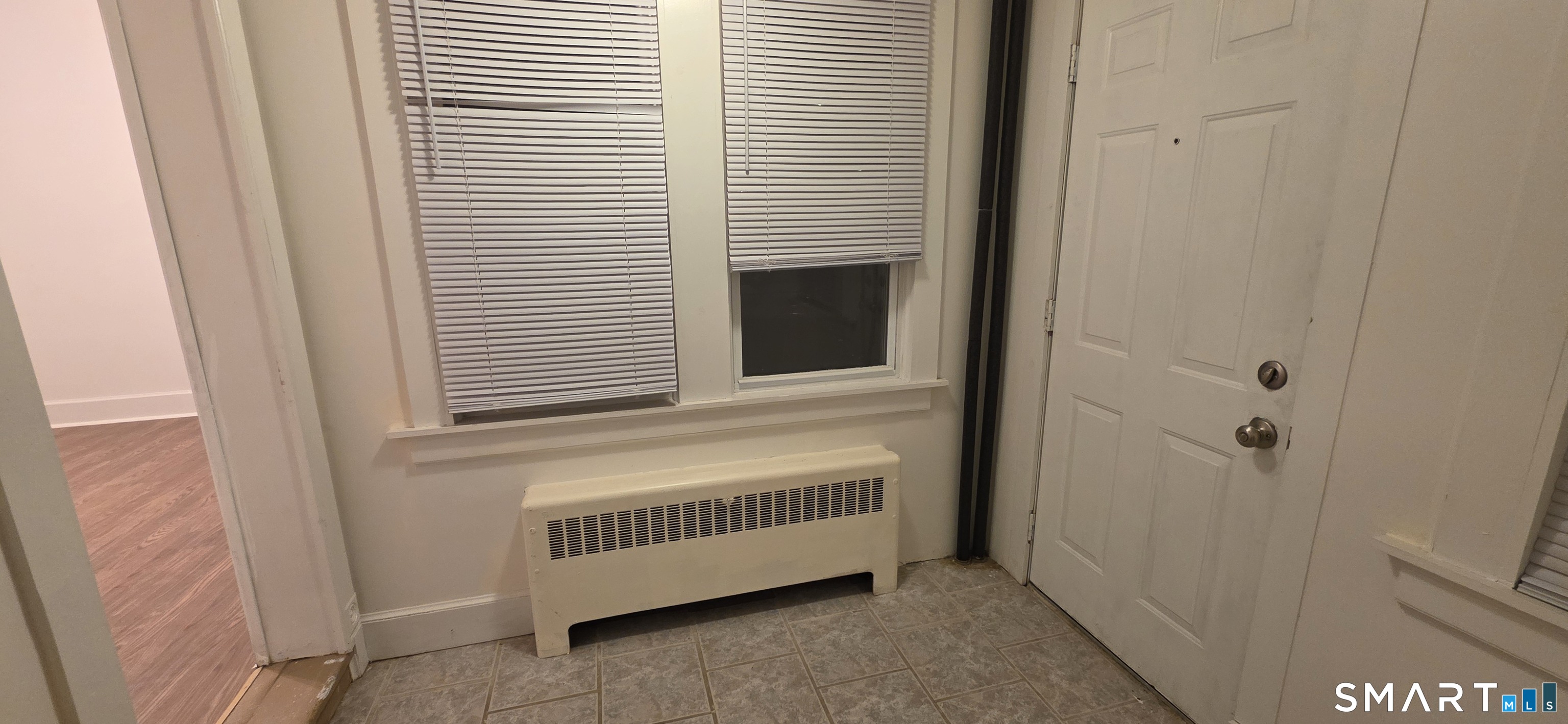 137 Birch Street, Unit 139 Manchester, CT 06040 - Photo 6 of 14 a view of a porch with a door