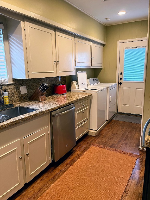 2106 Colquitt Street Houston, TX 77098 - Photo 18 of 31 a kitchen with a sink cabinets and window