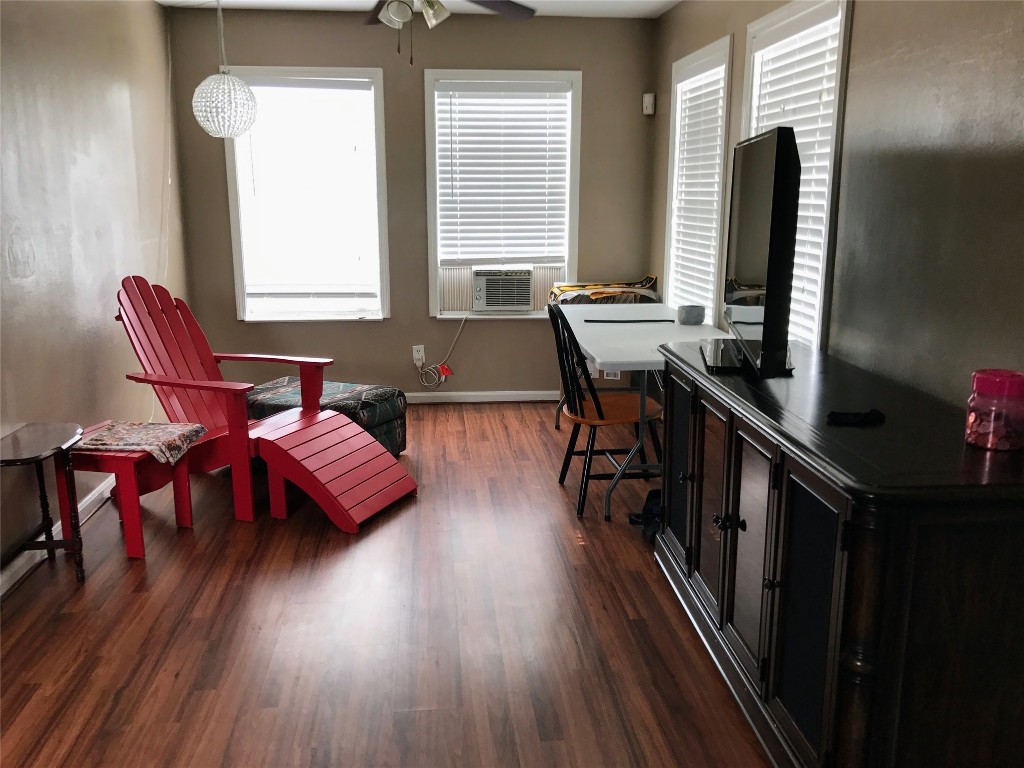 2106 Colquitt Street Houston, TX 77098 - Photo 5 of 31 a view of a workspace with furniture and window