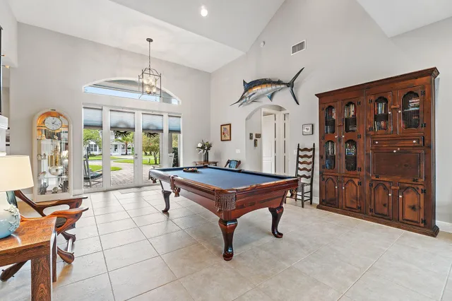 a spacious bathroom with a tub sink shower and mirror