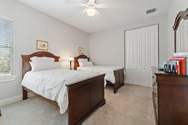a view of patio with couches and pool
