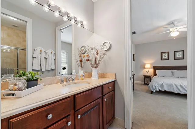 a view of a swimming pool with a patio and a yard