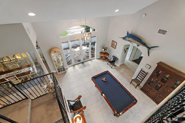 a view of a lake with a house in the background