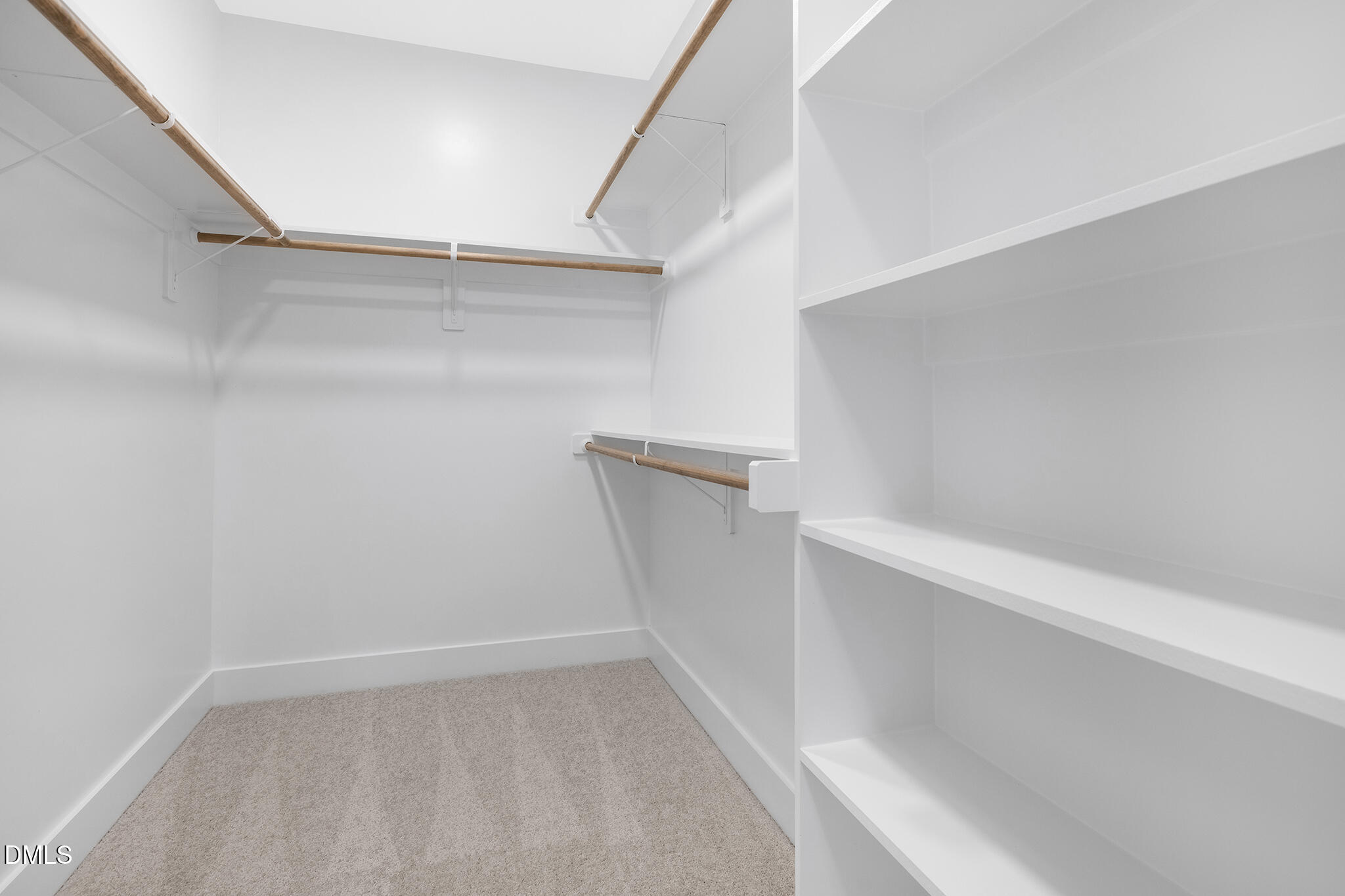 2412 Adrift Road Fuquay-Varina, NC 27526 - Photo 9 of 19 a view of an empty walk in closet