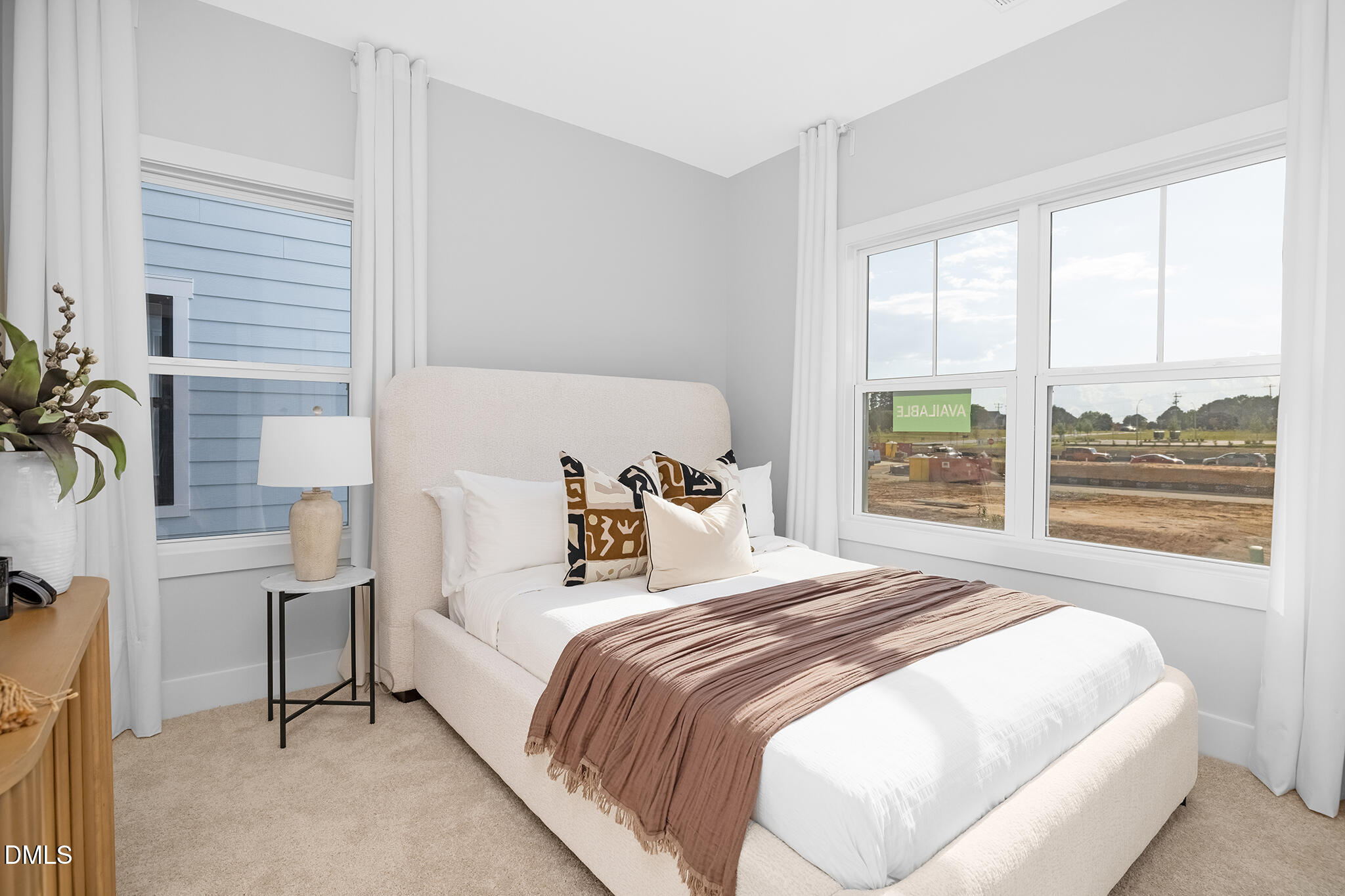 2412 Adrift Road Fuquay-Varina, NC 27526 - Photo 10 of 19 a bedroom with a bed and a large window with outer view