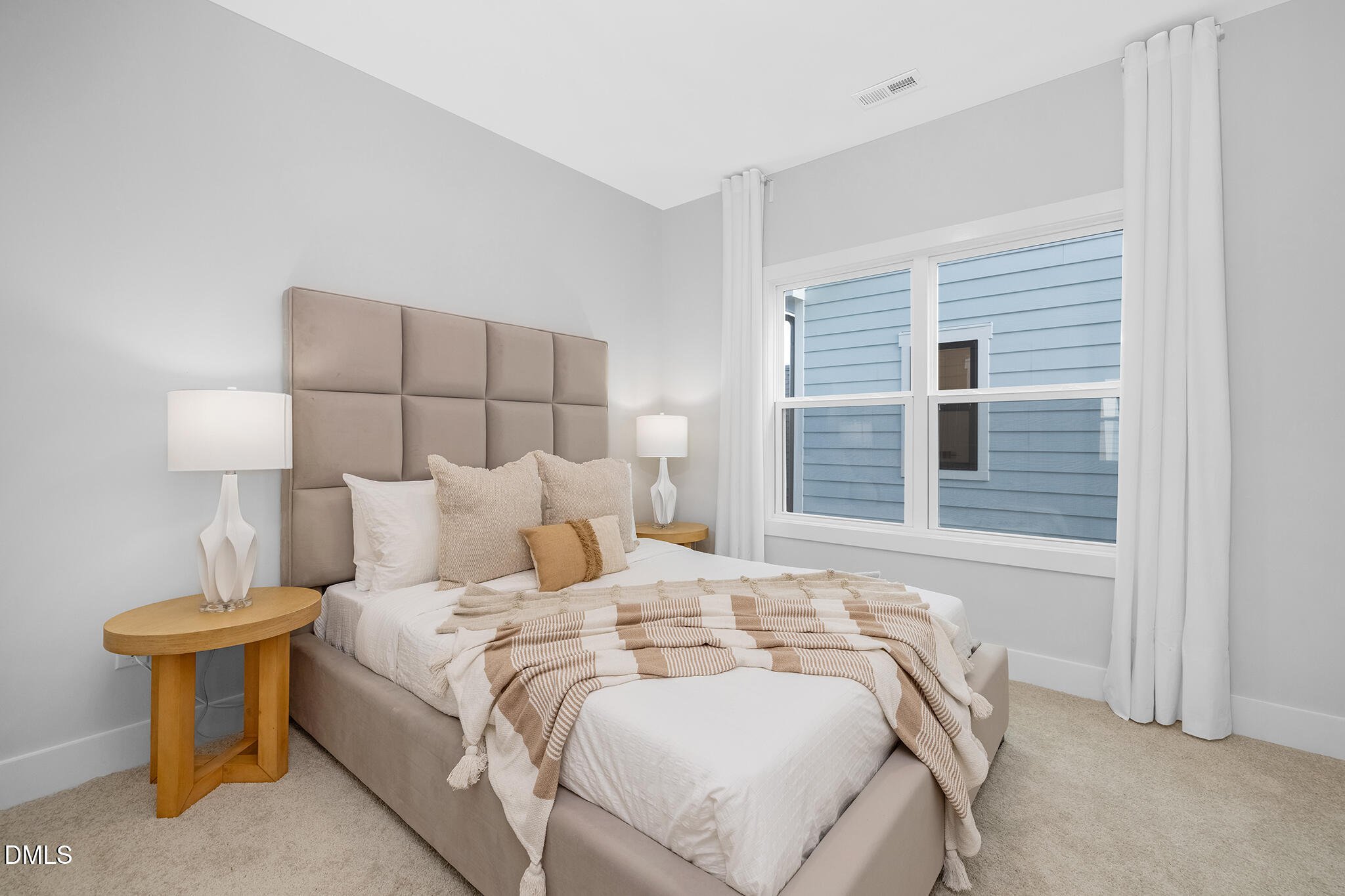 2412 Adrift Road Fuquay-Varina, NC 27526 - Photo 12 of 19 a bedroom with a bed and a window