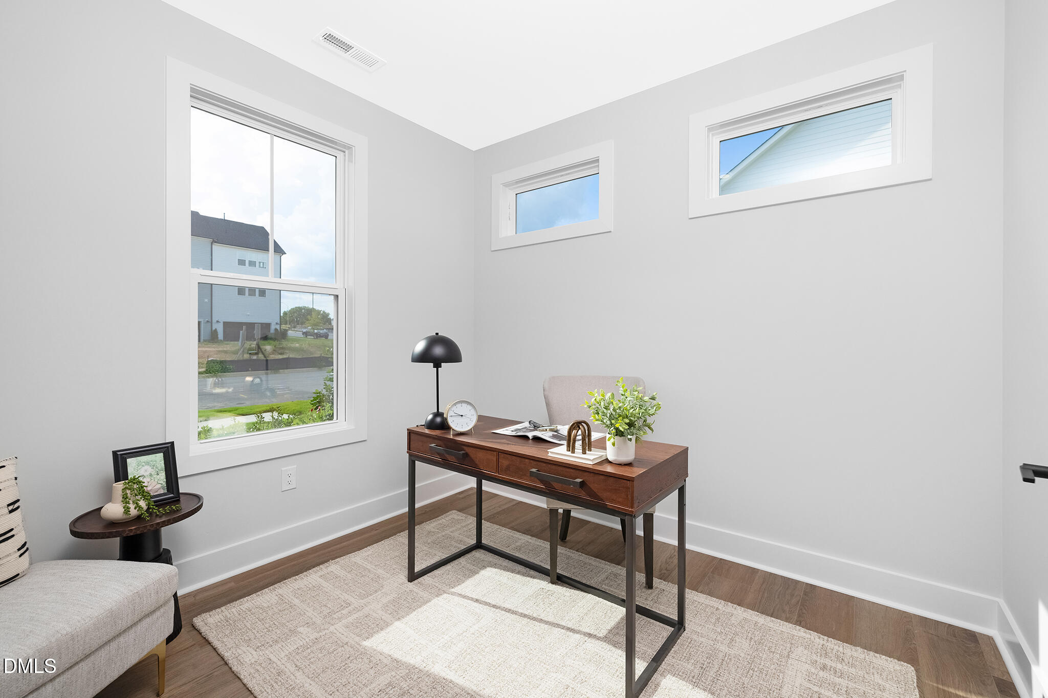 2412 Adrift Road Fuquay-Varina, NC 27526 - Photo 13 of 19 a living room with furniture and a window