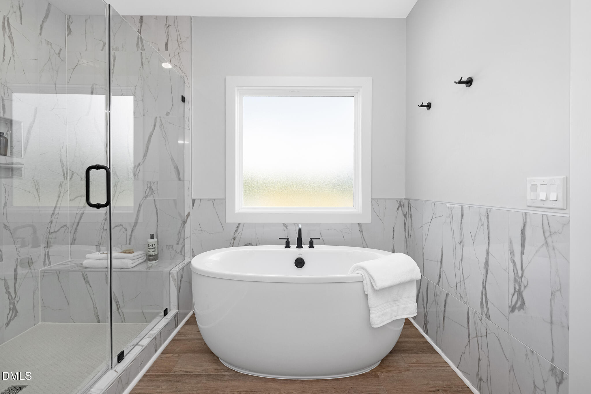 2412 Adrift Road Fuquay-Varina, NC 27526 - Photo 7 of 19 a white bath tub sitting next to a sink