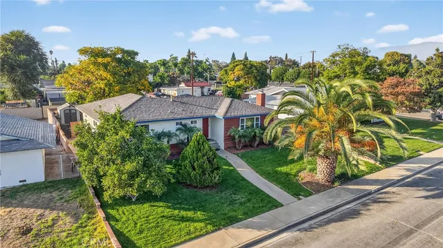 a view of a house with a garden