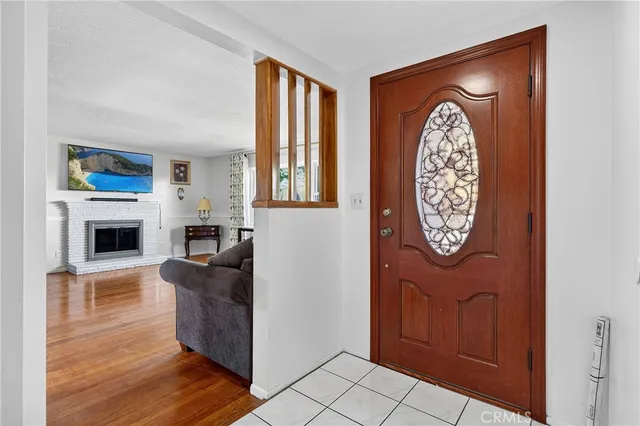 a view of a livingroom with furniture and a fireplace