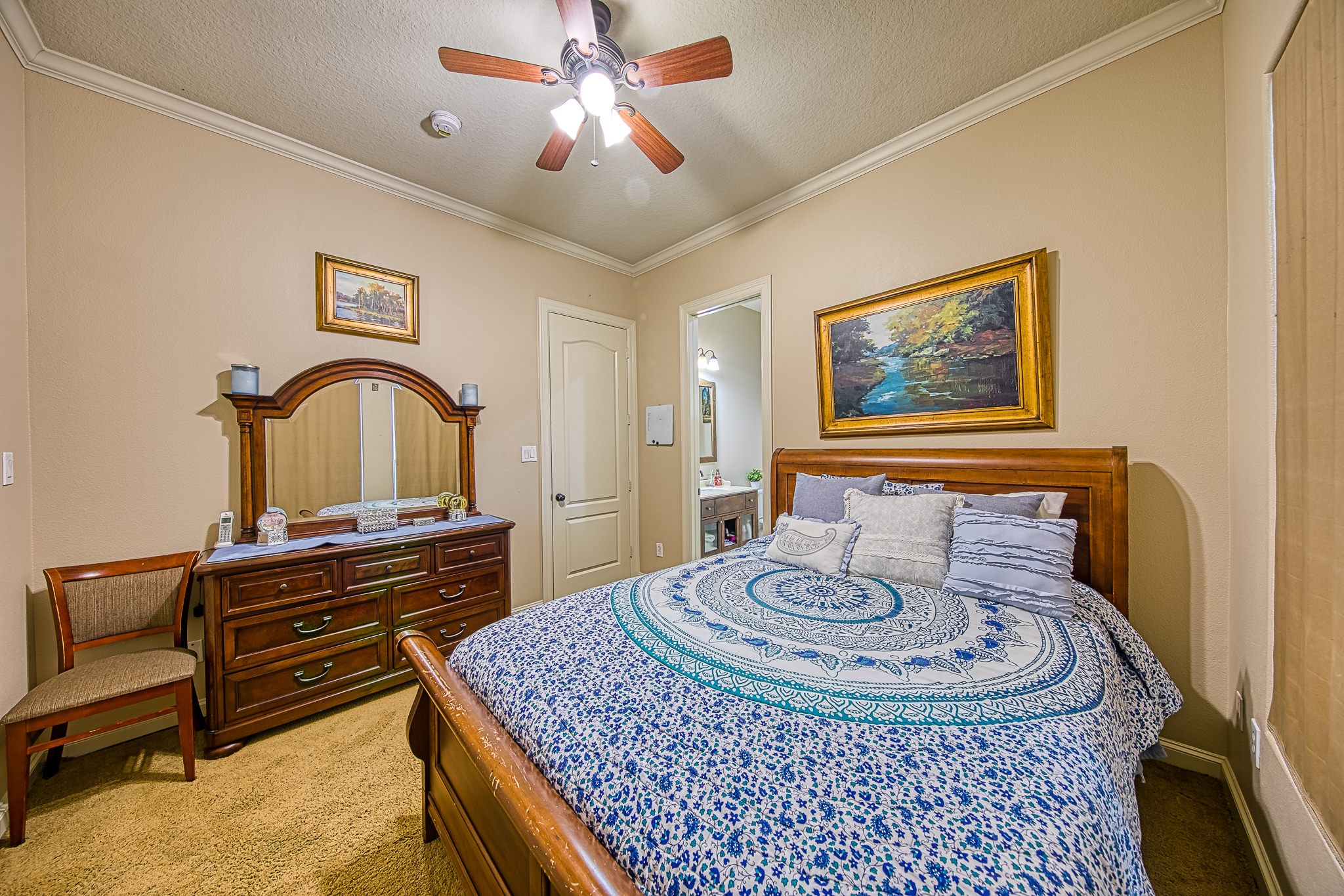 6310 Hamman Street, Unit D Houston, TX 77007 - Photo 31 of 41 a bedroom with a bed and a dresser