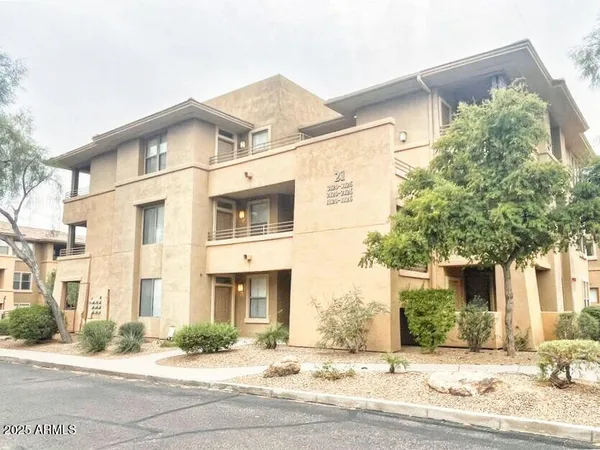 a view of a building along the street