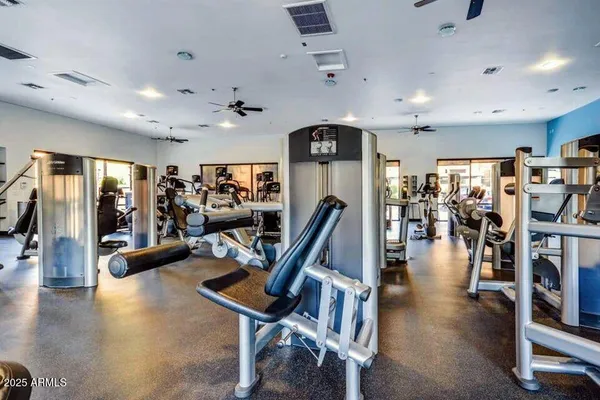 a room with pool table and window