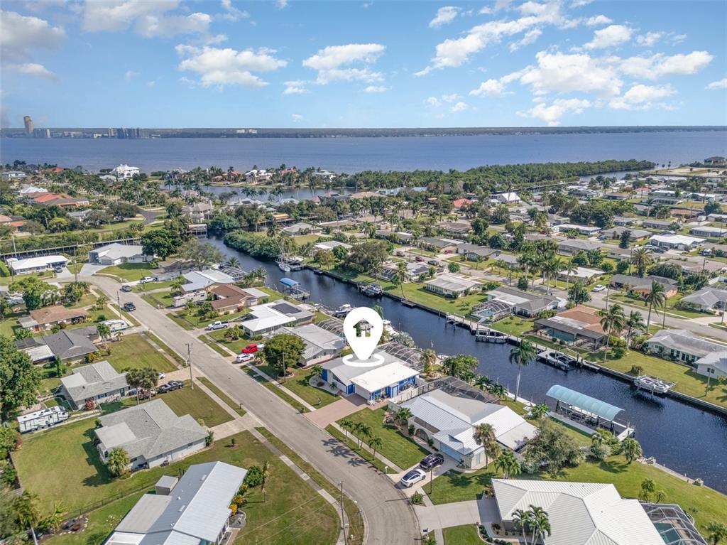 1661 Swan Terrace North Fort Myers, FL 33903 - Photo 1 of 43 an aerial view of a city