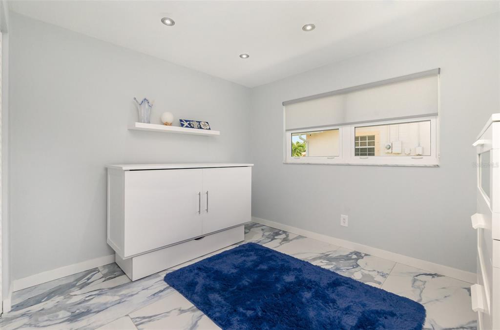 1661 Swan Terrace North Fort Myers, FL 33903 - Photo 27 of 43 a view of entryway with wooden floor